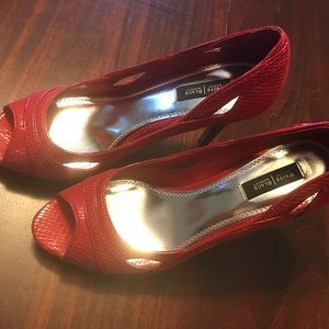 Red peep toe pumps